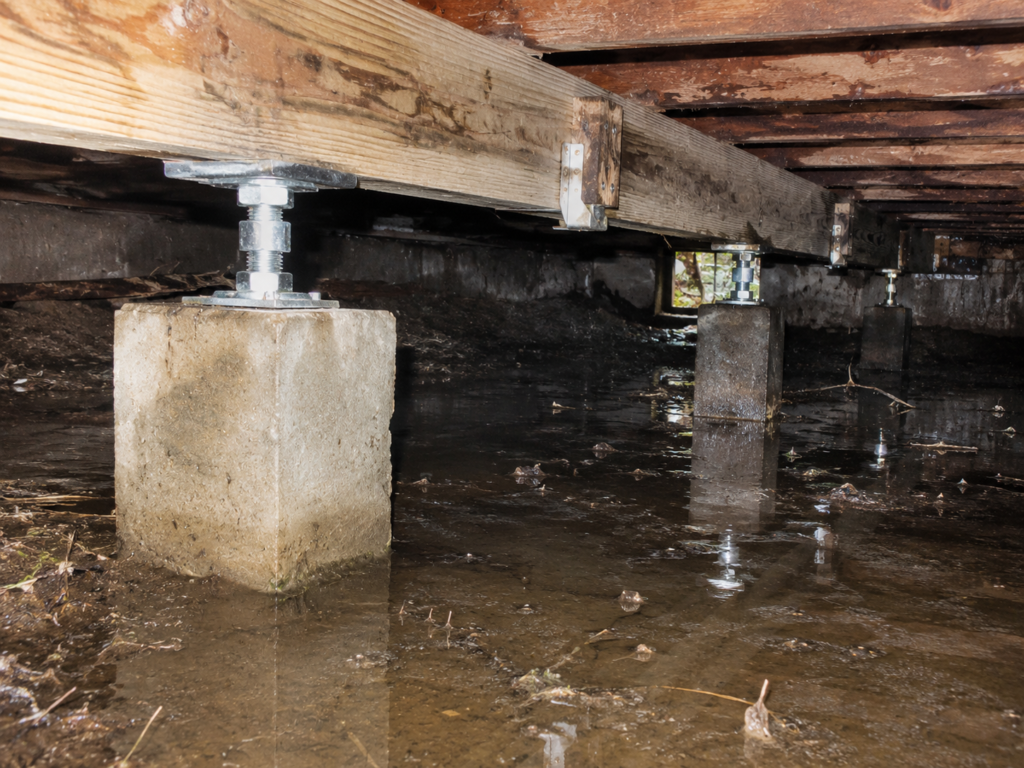 How Much Does Foundation Repair Cost in Dallas-Fort Worth? 7 Water damage beneath residential home