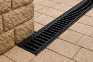 Trench drain protecting foundation from water
