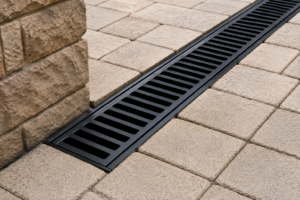 Trench drain protecting foundation from water